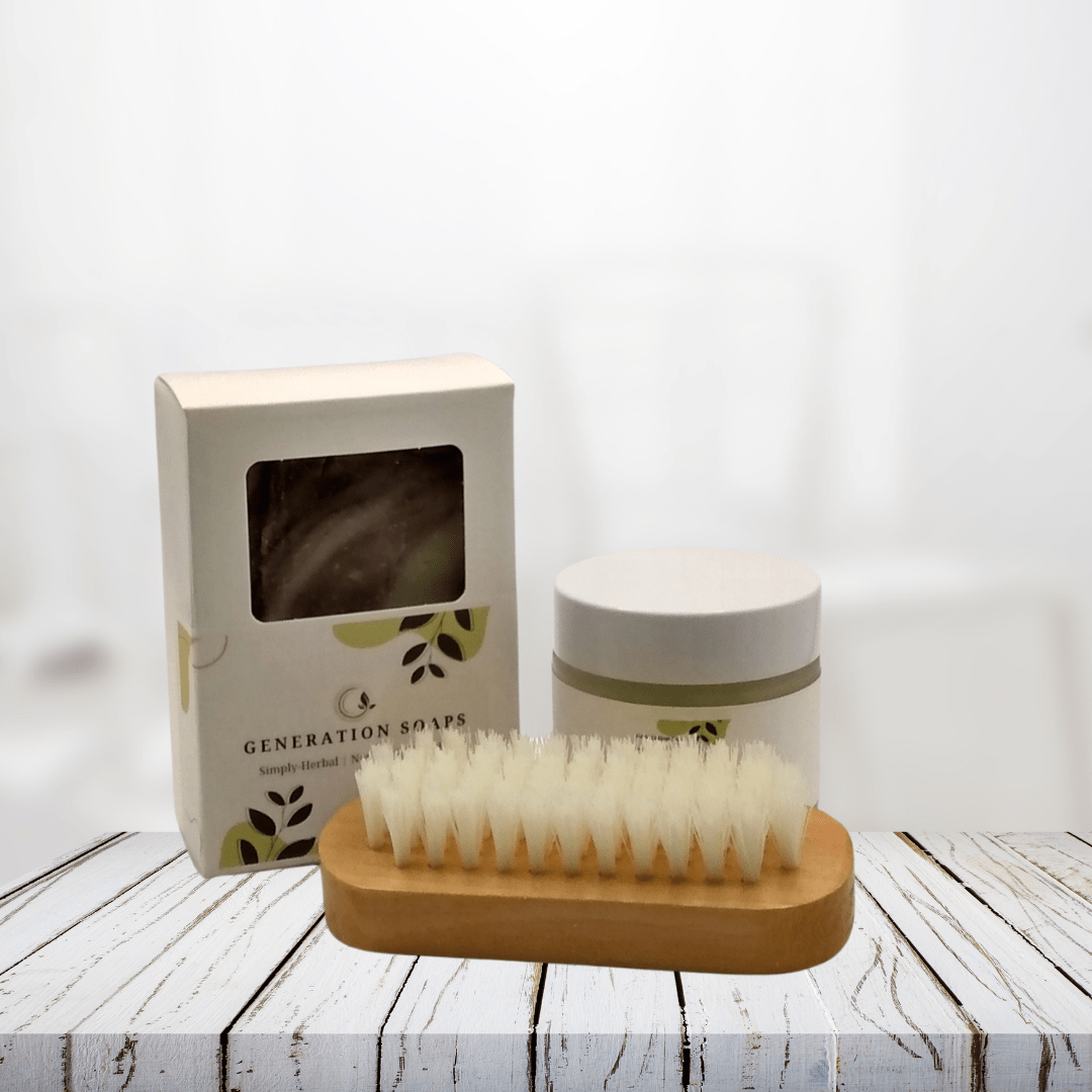 Petal Soft Hands & Body Gift Set with herbal soap, skin balm, and nail brush on a wooden surface.
