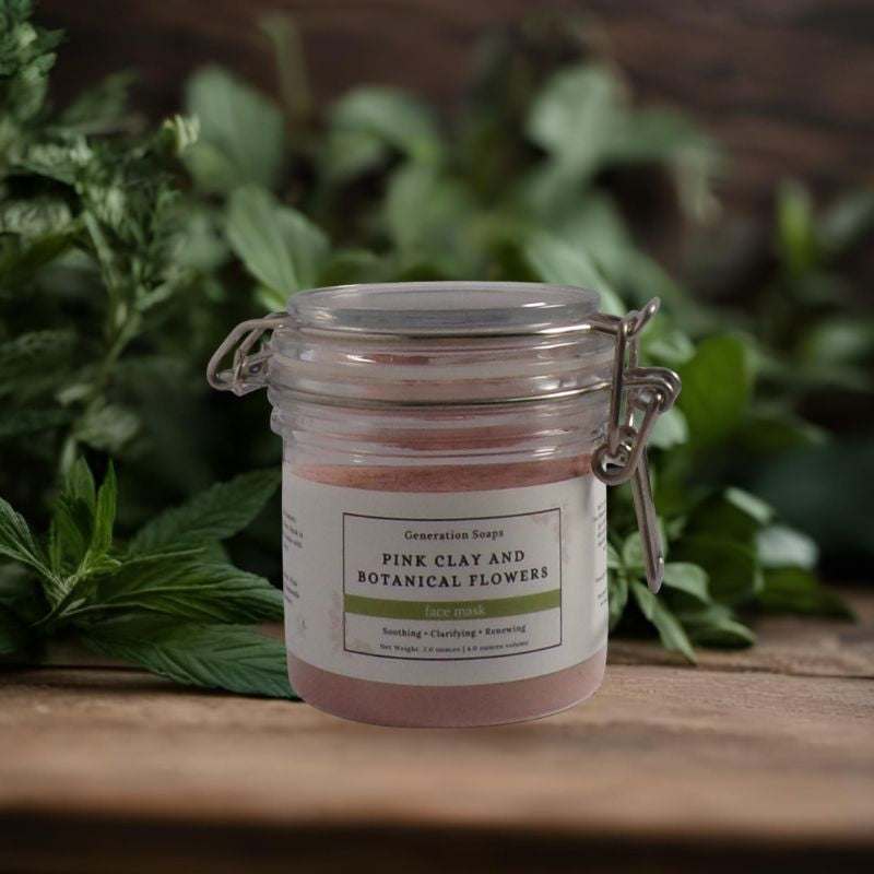 Pink clay and botanical flowers face mask powder with floral ingredients for soothing and clarifying skin care