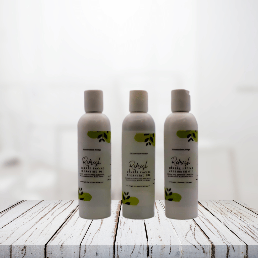 Refresh Herbal Facial Cleansing Oil bottles on a wooden surface.