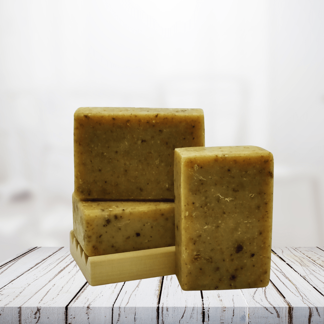 Natural Soap Tea Tree and Calendula Soap with essential oils on wooden tray, handcrafted and nourishing.
