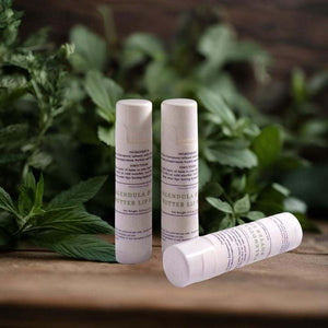 Calendula and shea butter lip balm tube with natural moisturizing ingredients