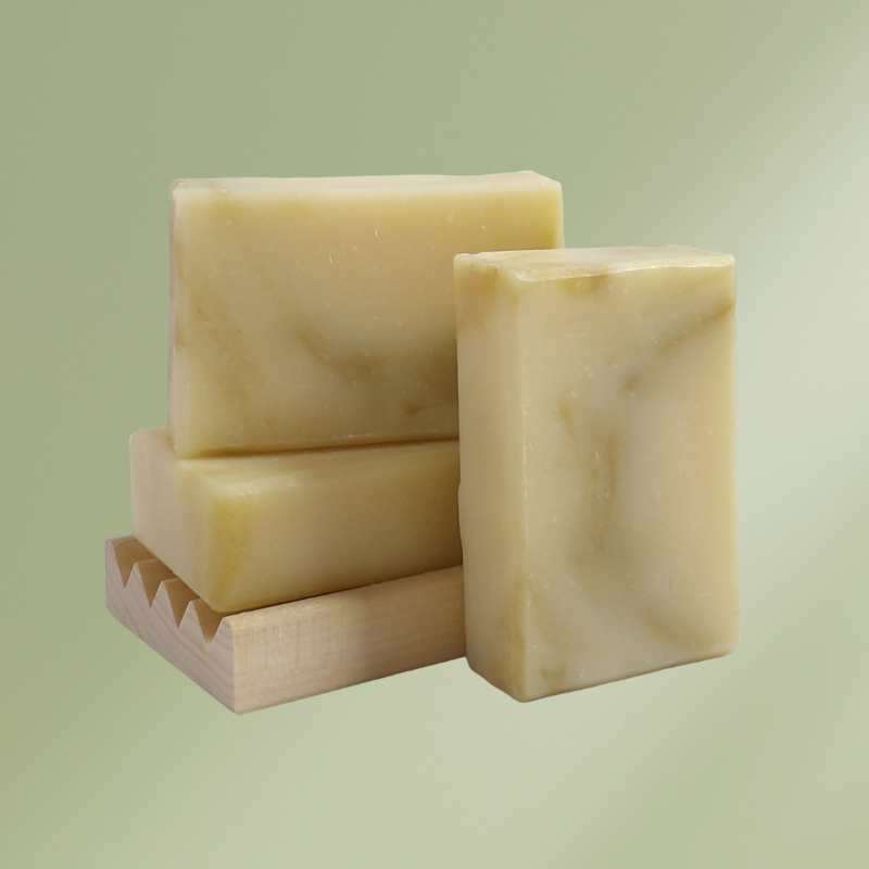 Natural soap bar with elderflowers, shea butter, and essential oils for soothing and moisturizing skin