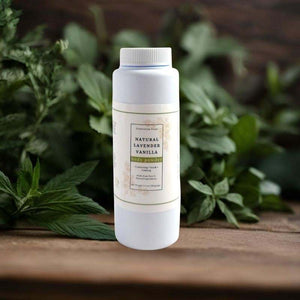 Natural Lavender Vanilla body powder in a shaker bottle with lavender and vanilla accents