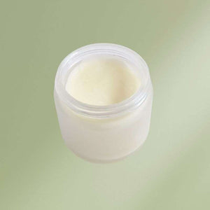 Petal Soft Herbal Skin Salve in jar with floral ingredients for soothing and moisturizing skin care