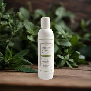 Bottle of Refresh Herbal Facial Cleansing Oil with natural botanical ingredients for moisturizing and hydrating skin