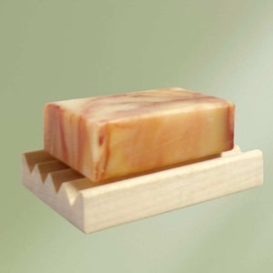 Handcrafted natural wood soap dish with slatted design for soap drainage and longevity